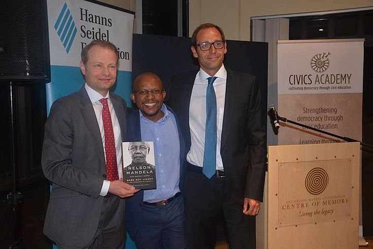Dr Wolf Krug and Hanns Bühler with Sello Hatang, CEO of the Nelson Mandela Foundation