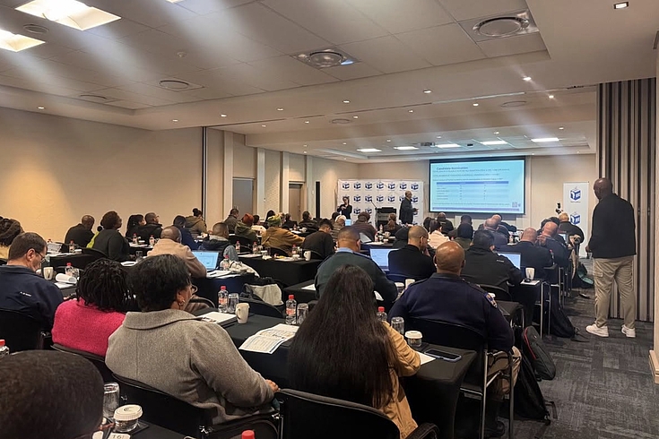 Room of people: Participants during the informative briefing in Cape Town