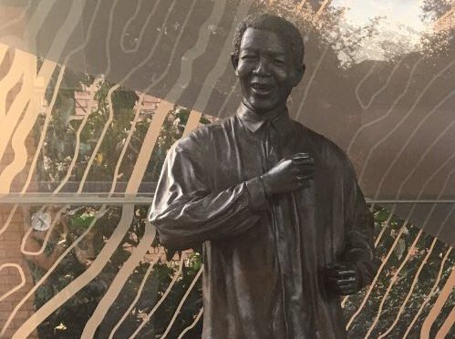 Photograph: statue of Nelson Mandela - dancing, in front of his Foundation