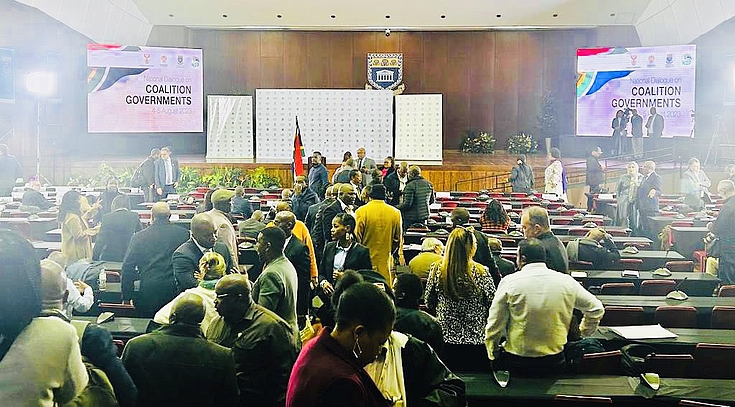 Hall with people: At the National Dialogue on Coalitions in August 2023