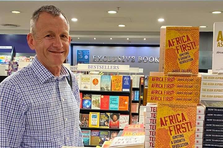 Dr Jakkie Cilliers and his new book - on top of the pile 